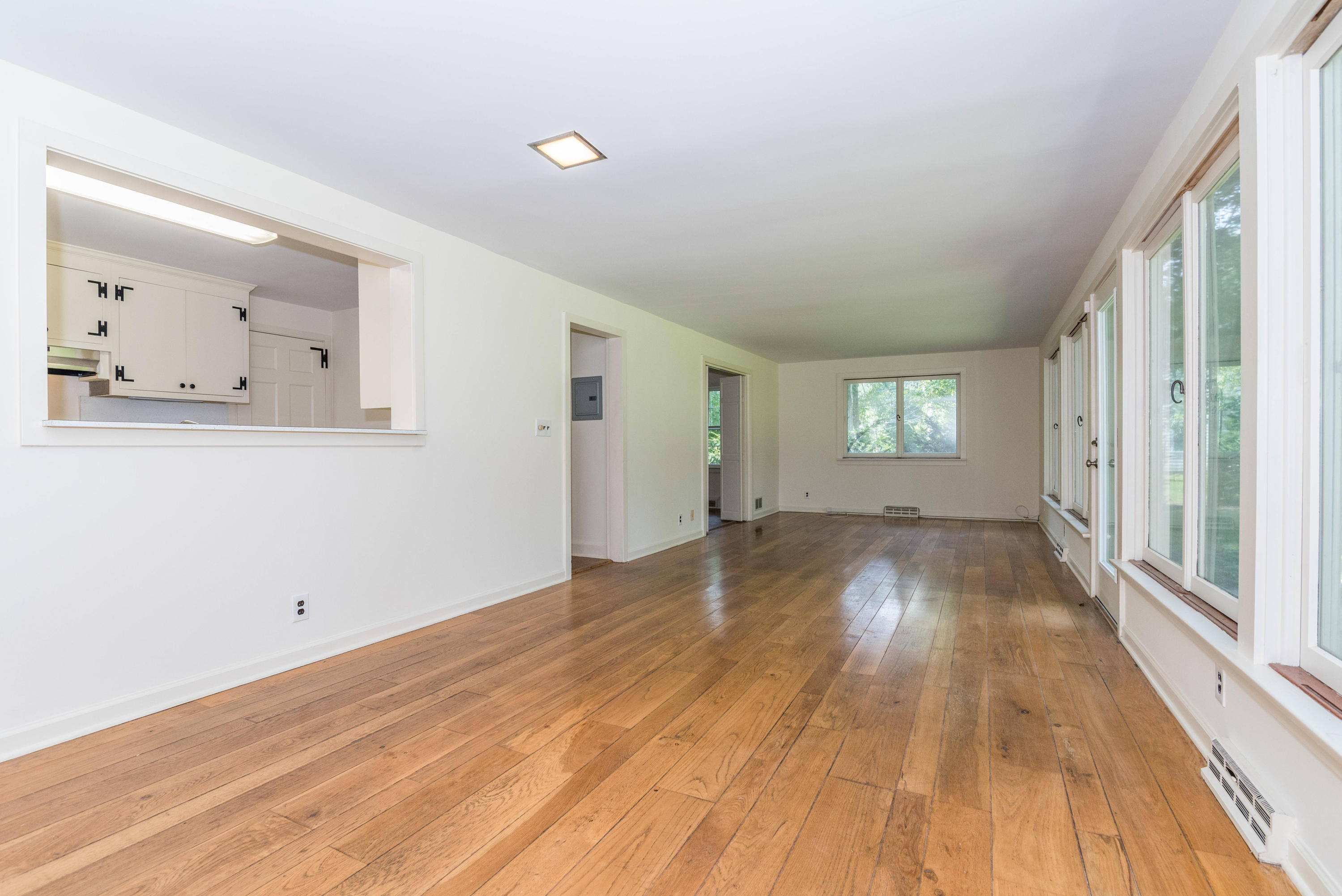 10 Rocaton Road Darien, CT 06820 - Photo 12 of 24 a view of empty room with wooden floor and fan