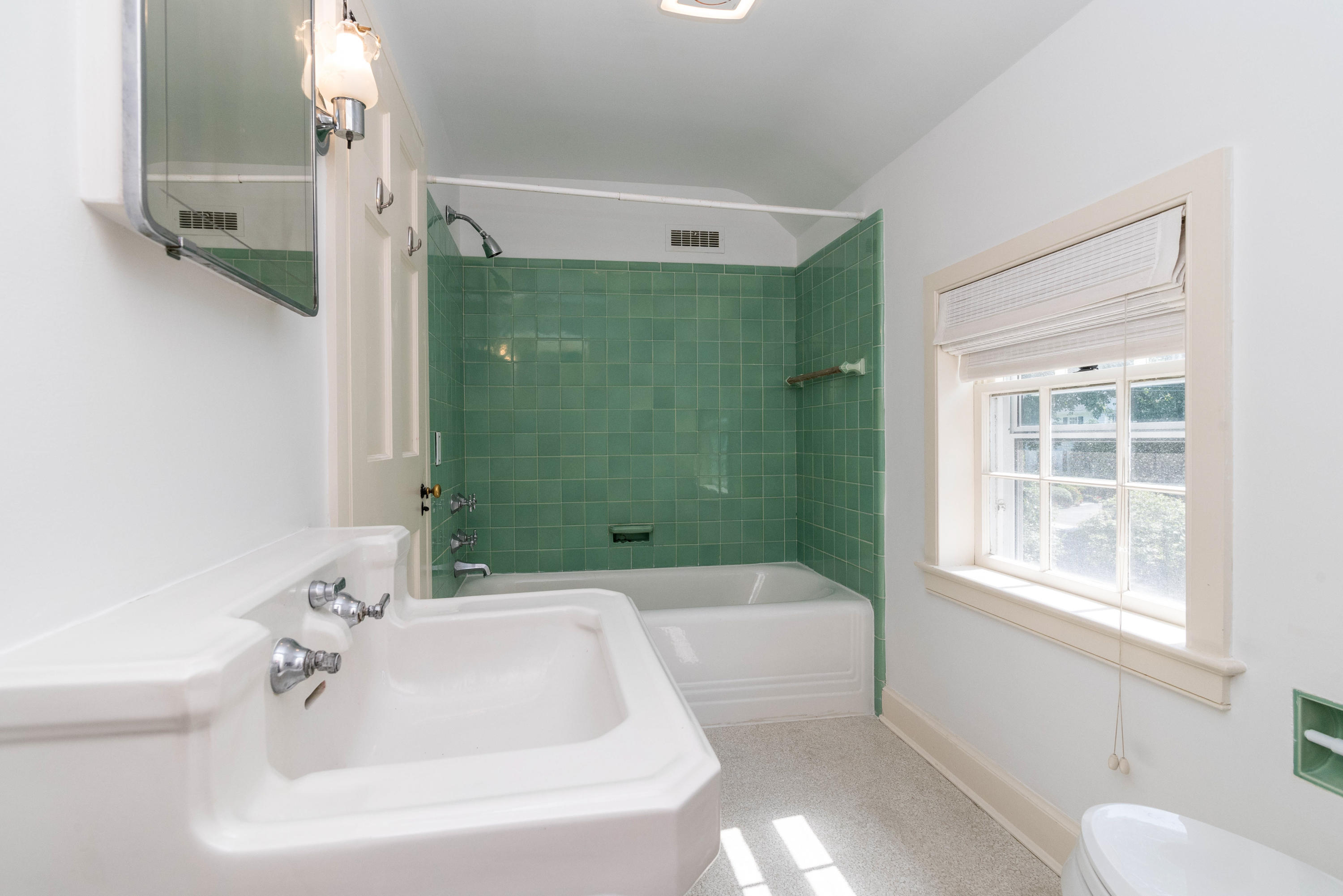 10 Rocaton Road Darien, CT 06820 - Photo 17 of 24 a bathroom with sink and bathtub