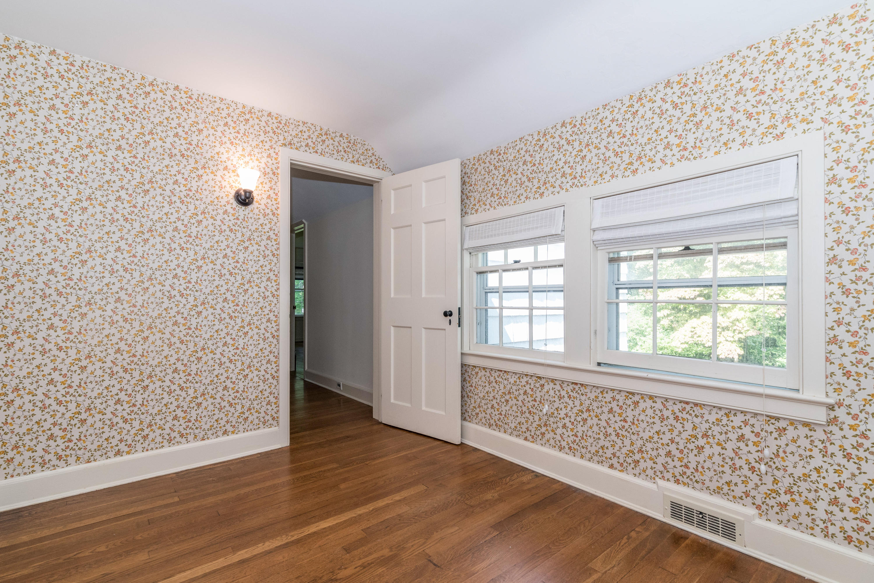 10 Rocaton Road Darien, CT 06820 - Photo 20 of 24 a view of an empty room with wooden floor and a window