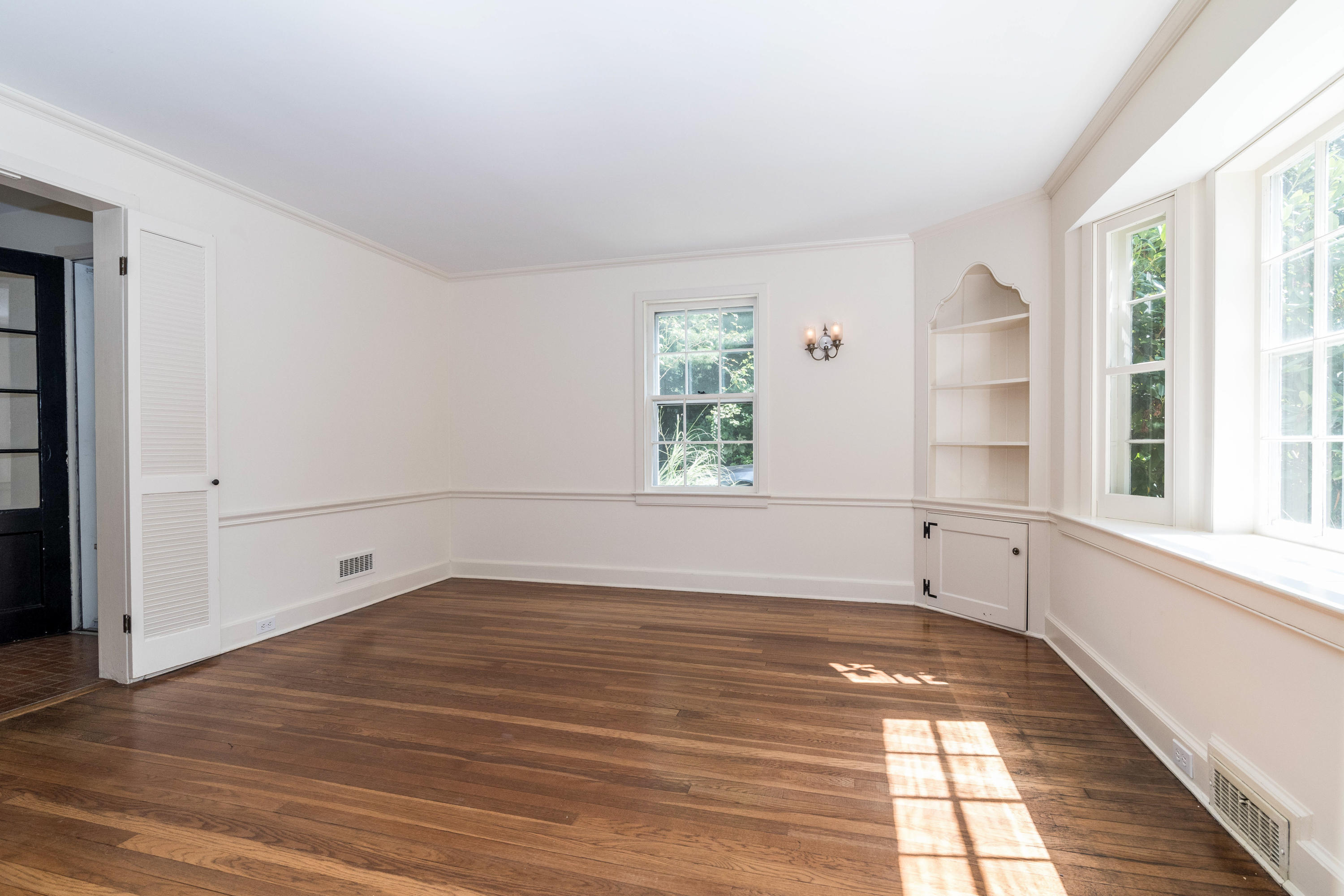 10 Rocaton Road Darien, CT 06820 - Photo 8 of 24 wooden floor in an empty room with a window