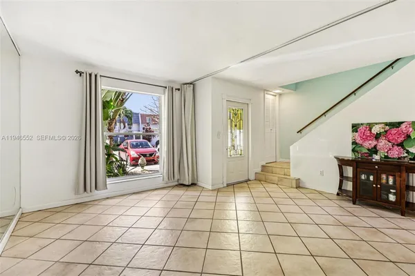 a view of a hallway with closet