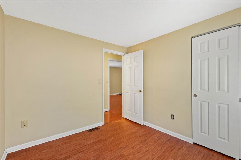 157 Valley View Road Eighty Four, PA 15330 - Photo 11 of 25 a view of an empty room with wooden floor
