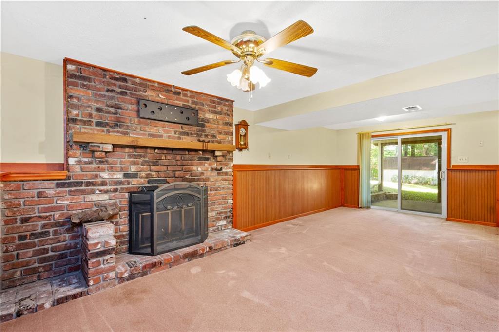 157 Valley View Road Eighty Four, PA 15330 - Photo 18 of 25 a view of an empty room with a fireplace and a window