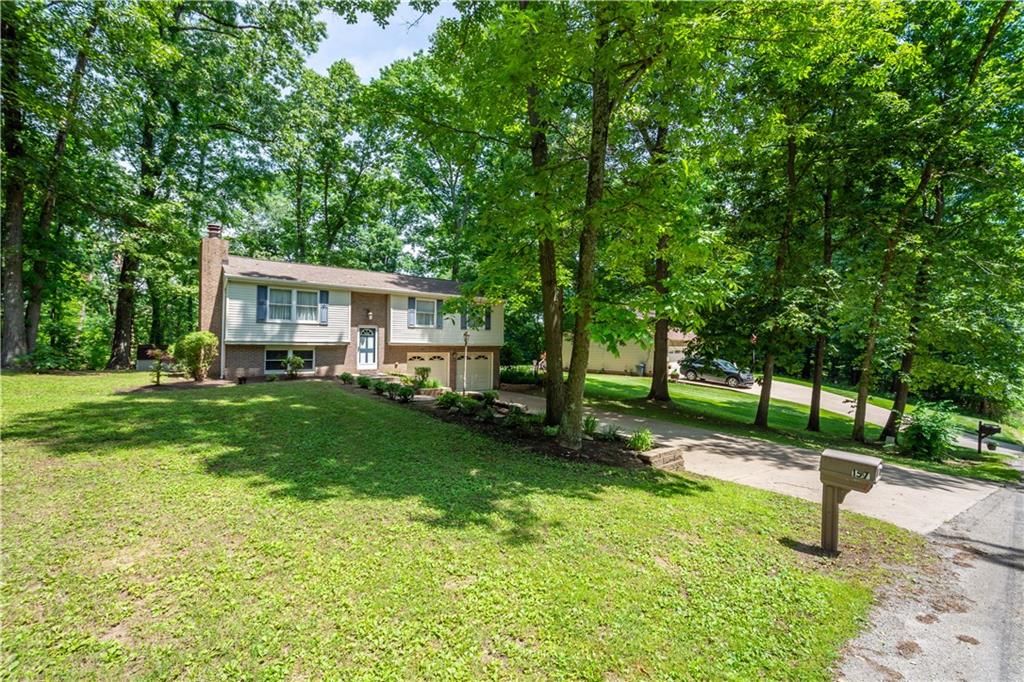 157 Valley View Road Eighty Four, PA 15330 - Photo 2 of 25 a house view with a garden space