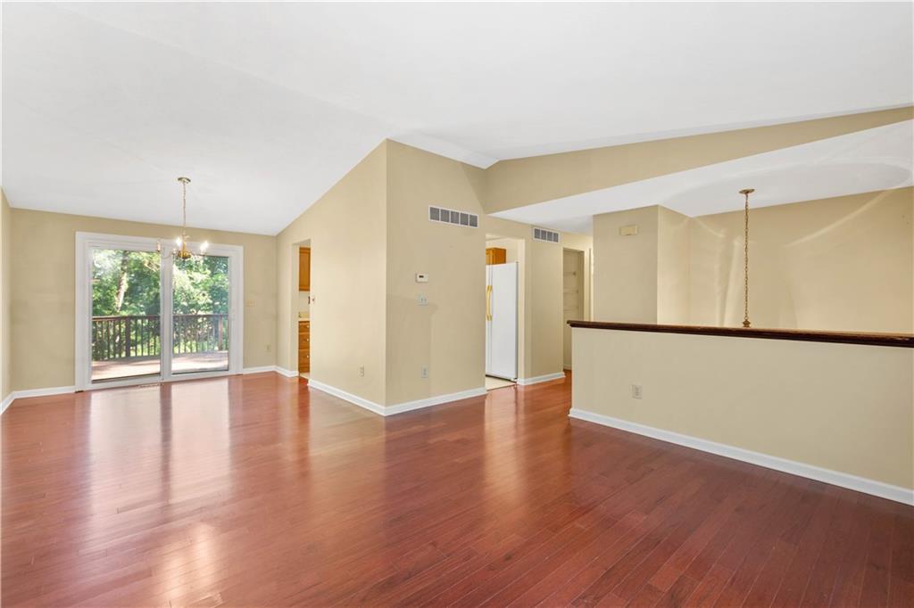 157 Valley View Road Eighty Four, PA 15330 - Photo 9 of 25 a view of an empty room with wooden floor and a window