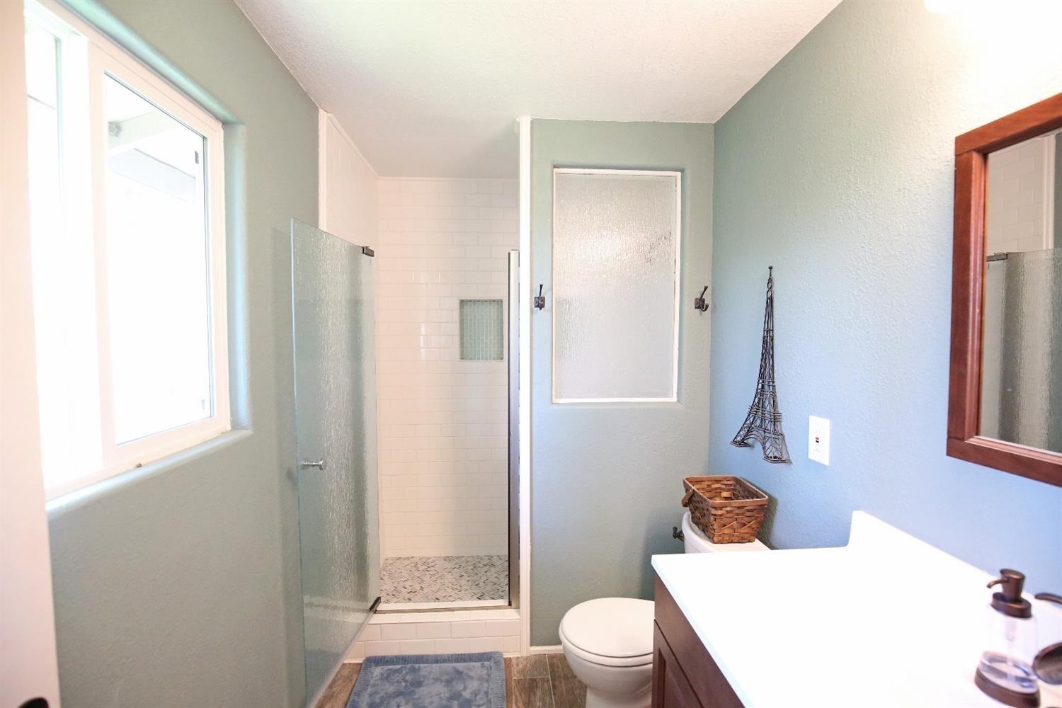 357 October Lane Merlin, OR 97532 - Photo 18 of 33 a bathroom with a sink toilet and shower