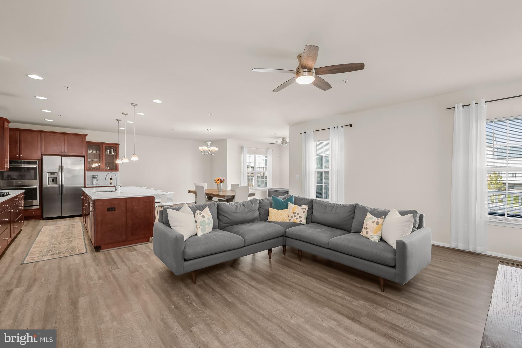 3515 Doc Berlin Drive Silver Spring, MD 20906 - Photo 11 of 49 a living room with furniture and a wooden floor