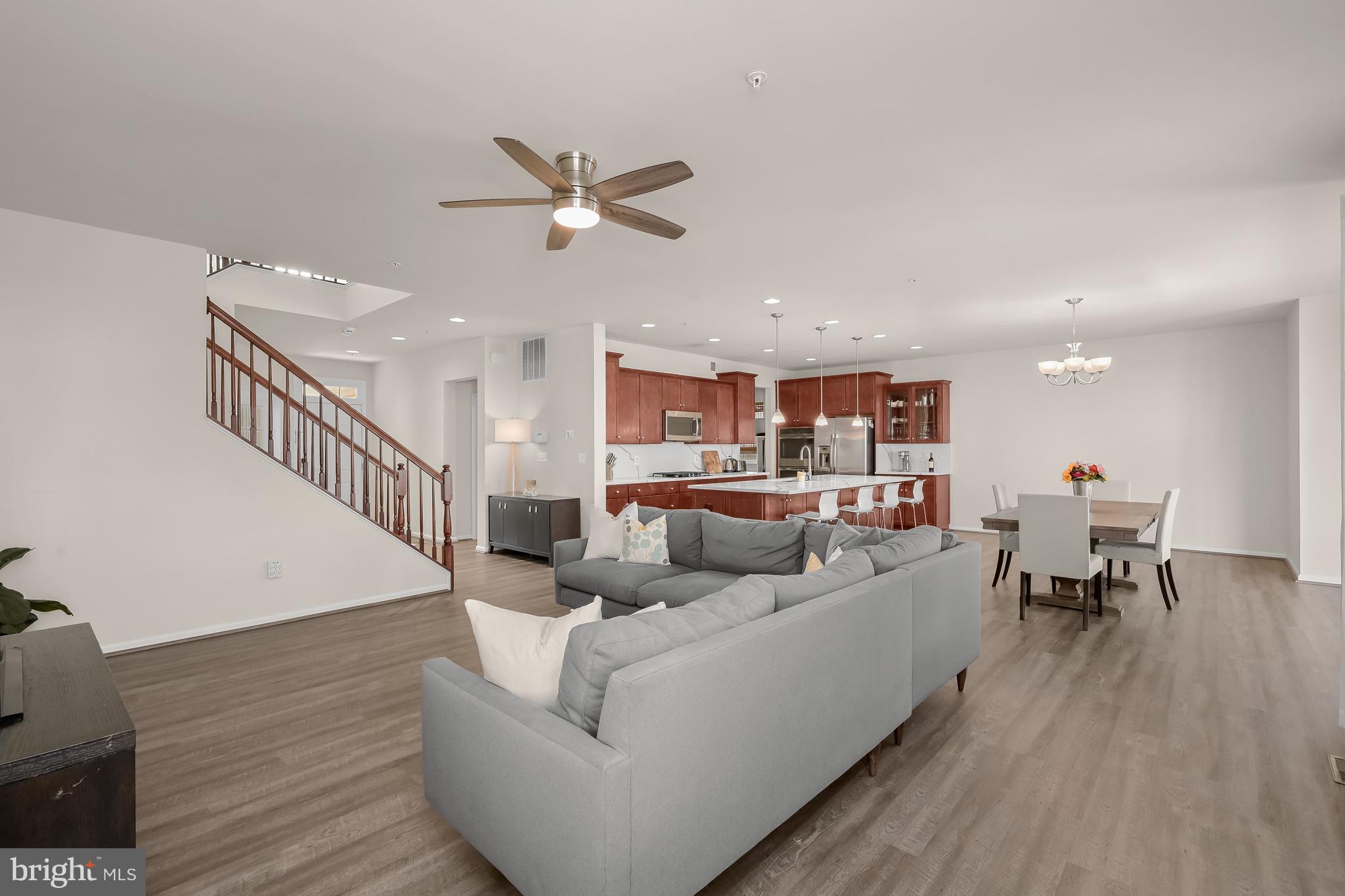 3515 Doc Berlin Drive Silver Spring, MD 20906 - Photo 12 of 49 a living room with furniture and a wooden floor