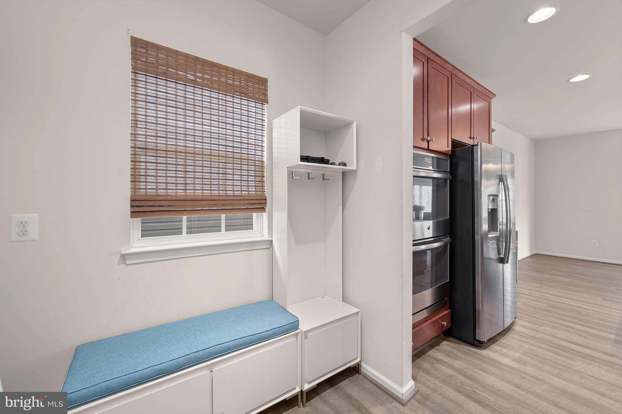3515 Doc Berlin Drive Silver Spring, MD 20906 - Photo 13 of 49 a kitchen with stainless steel appliances a refrigerator and a stove