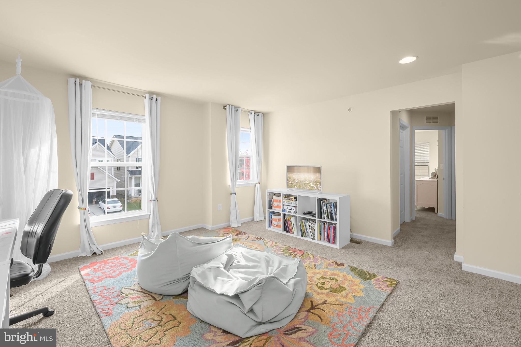 3515 Doc Berlin Drive Silver Spring, MD 20906 - Photo 17 of 49 a living room with furniture and a table