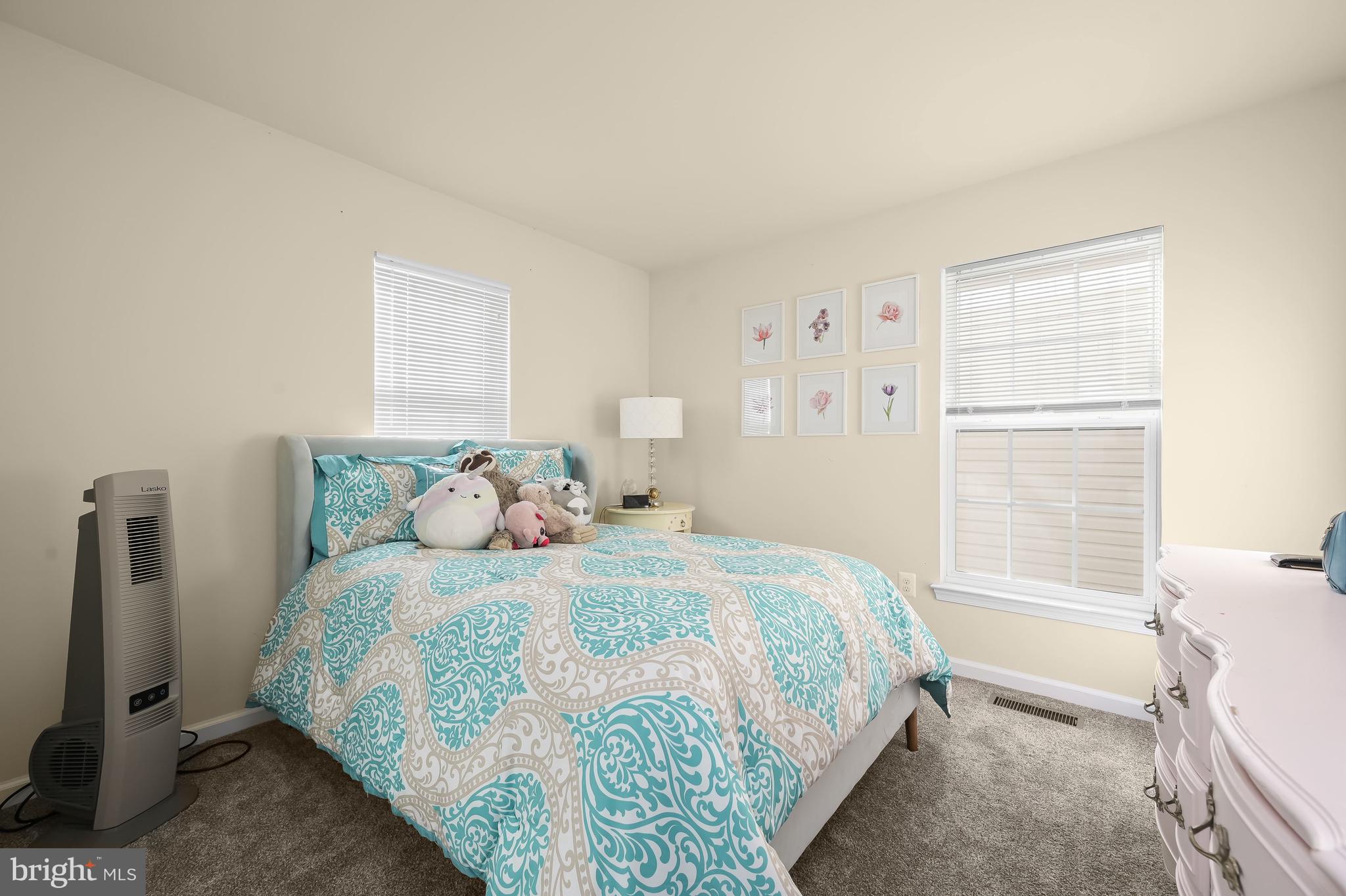 3515 Doc Berlin Drive Silver Spring, MD 20906 - Photo 26 of 49 a bedroom with a bed and a window