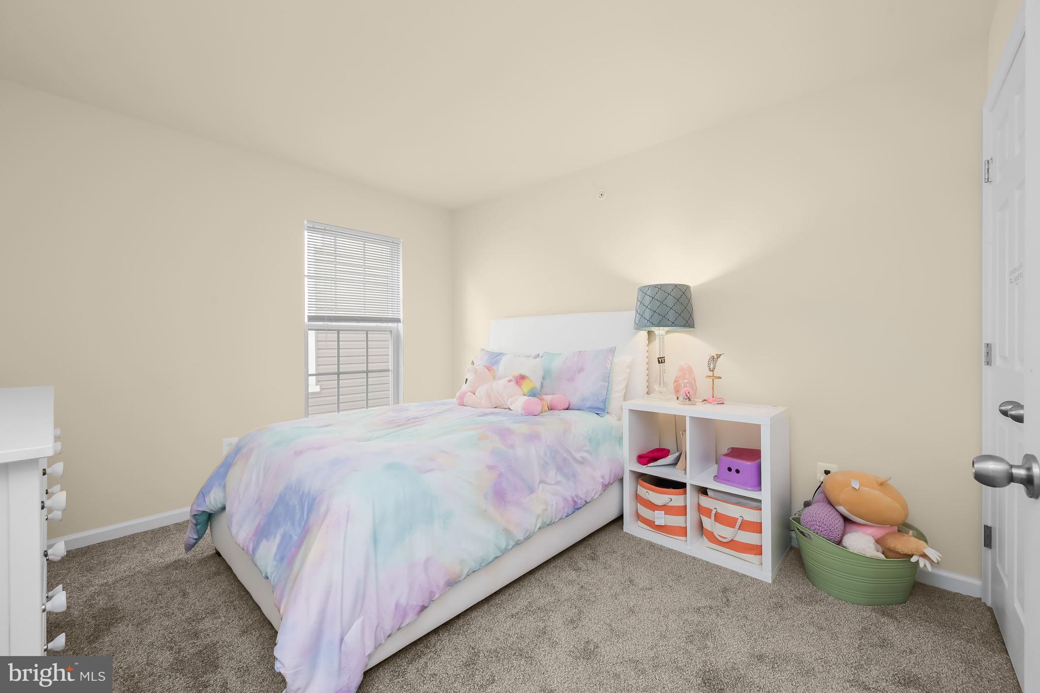 3515 Doc Berlin Drive Silver Spring, MD 20906 - Photo 28 of 49 a bedroom with a bed and a window