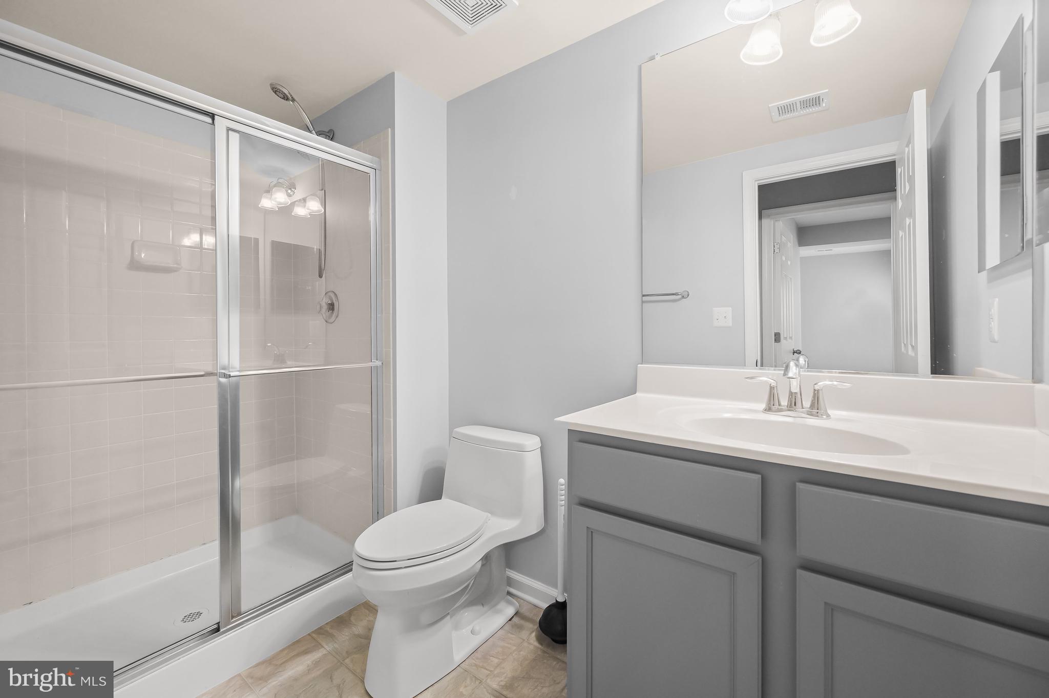 3515 Doc Berlin Drive Silver Spring, MD 20906 - Photo 36 of 49 a bathroom with a sink toilet and shower