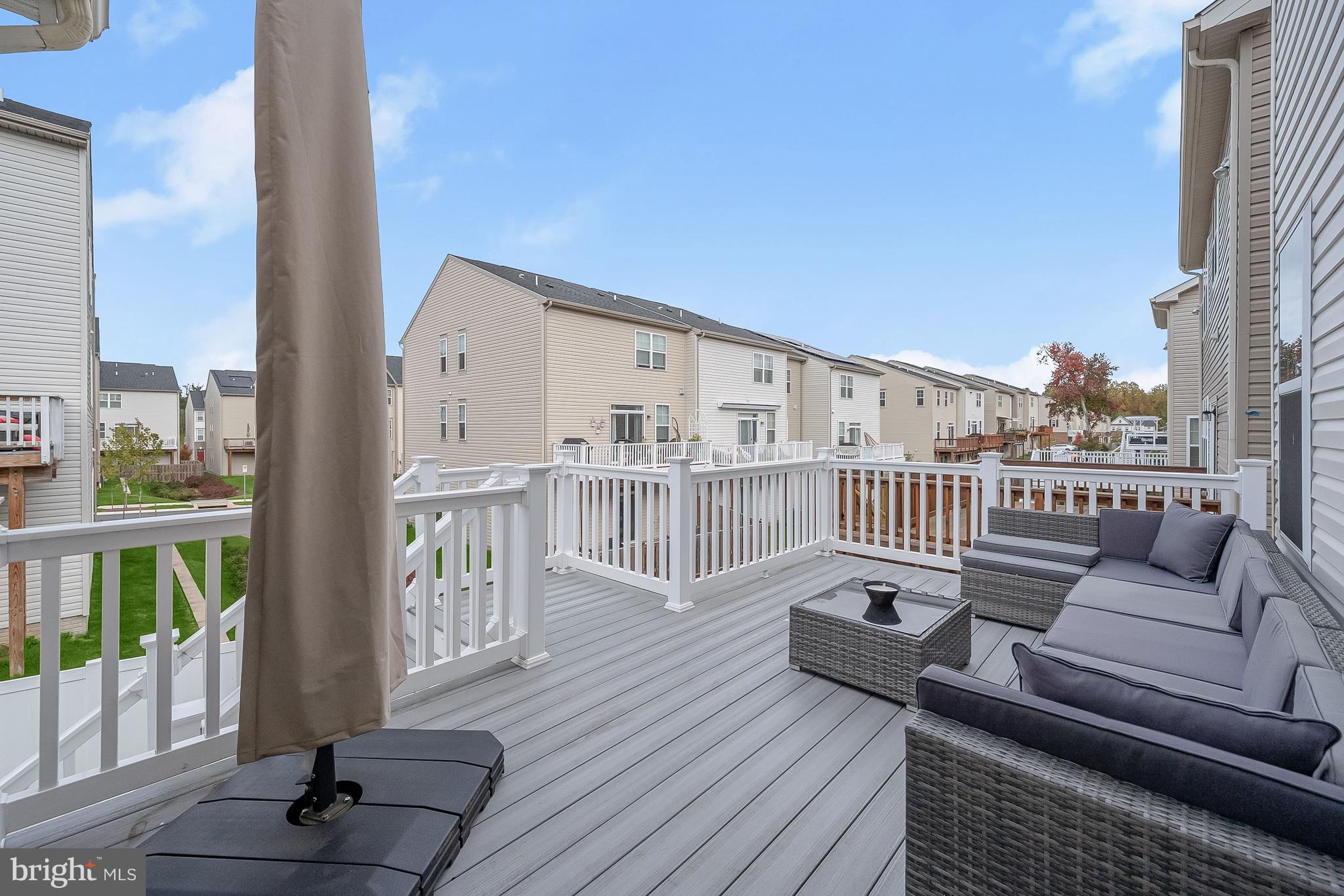3515 Doc Berlin Drive Silver Spring, MD 20906 - Photo 40 of 49 a view of a balcony with wooden floor