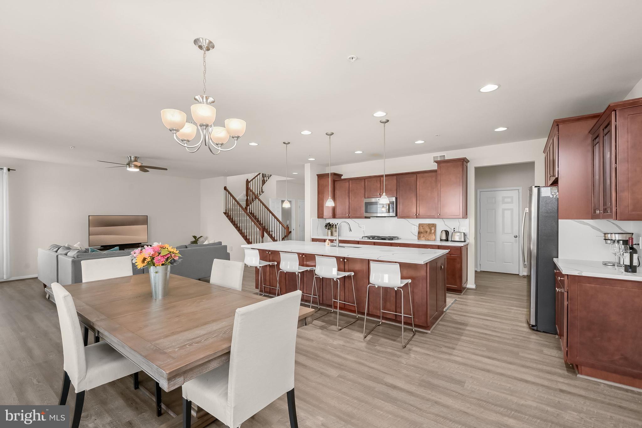 3515 Doc Berlin Drive Silver Spring, MD 20906 - Photo 8 of 49 a large kitchen with a table and chairs