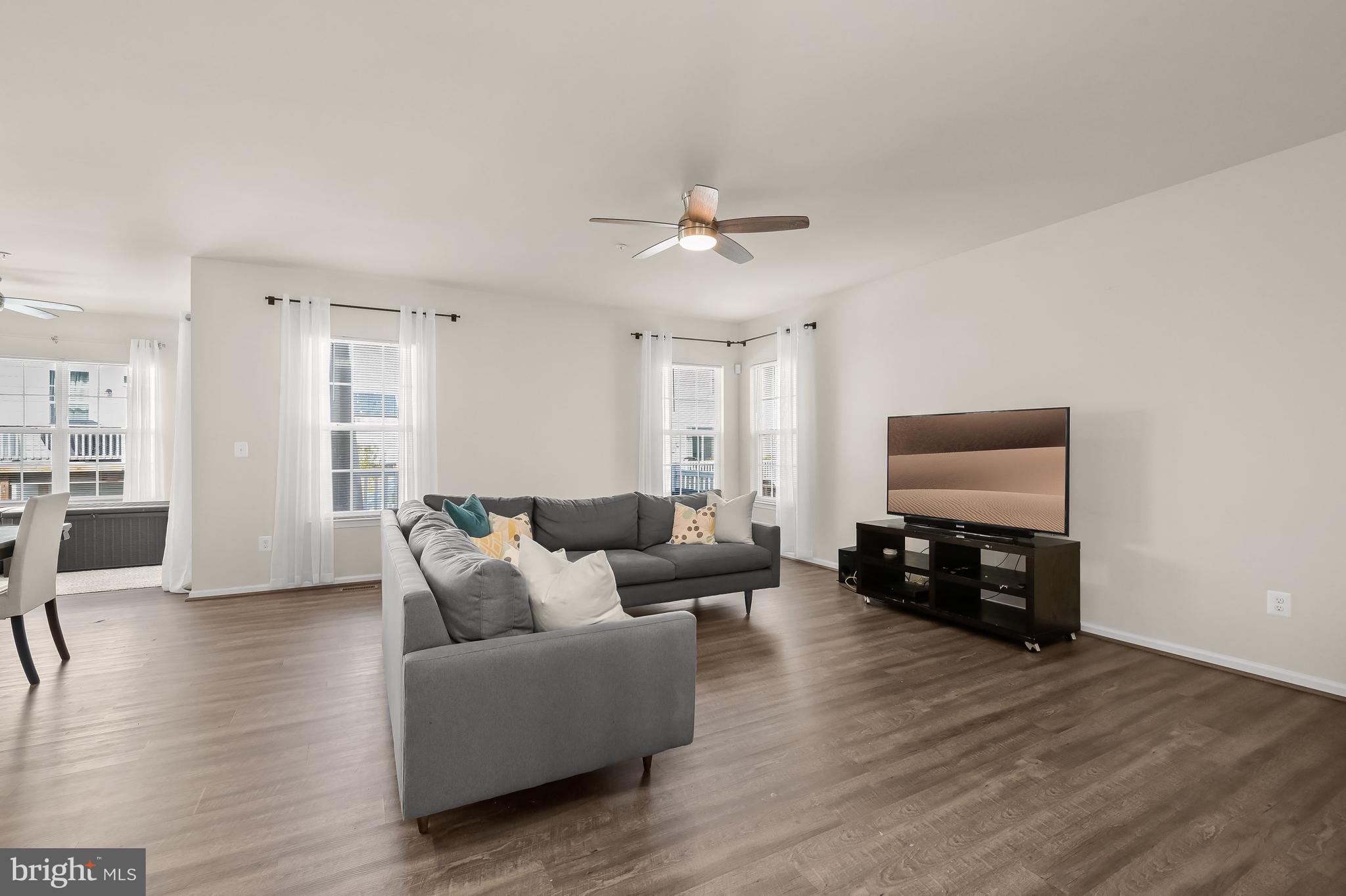 3515 Doc Berlin Drive Silver Spring, MD 20906 - Photo 10 of 49 a living room with furniture and a wooden floor