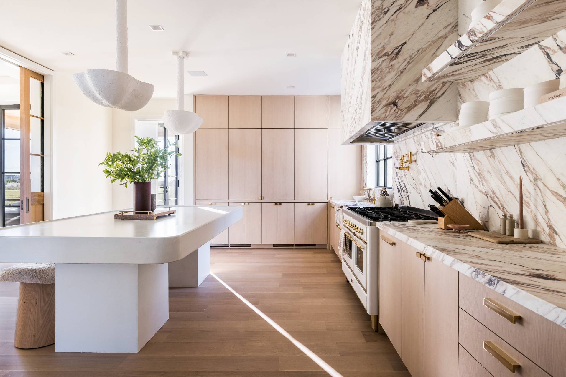 Undisclosed Address Sagaponack, NY 11962 - Photo 11 of 40 a kitchen with a sink and stove