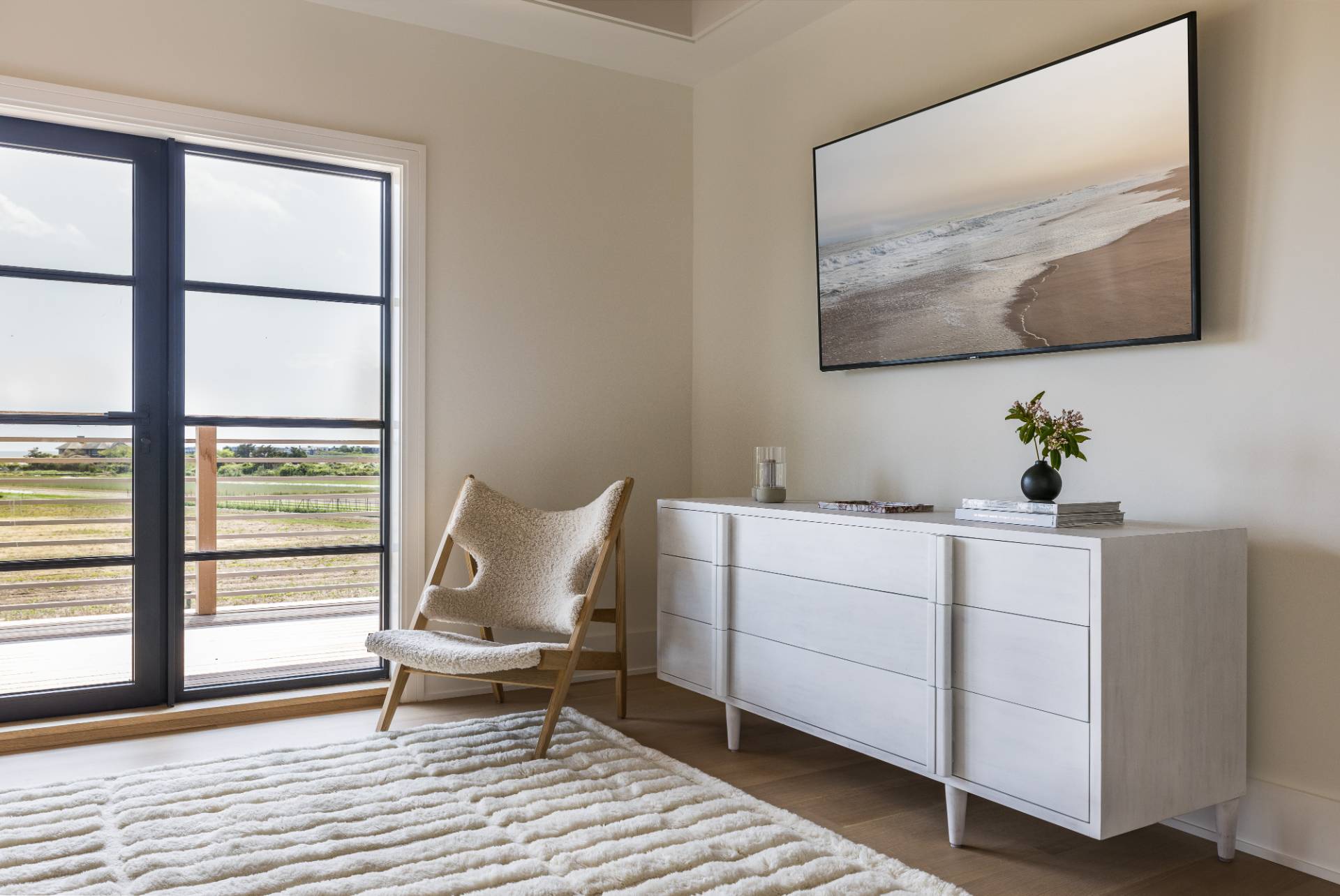 Undisclosed Address Sagaponack, NY 11962 - Photo 22 of 40 a living room with furniture and wooden floor