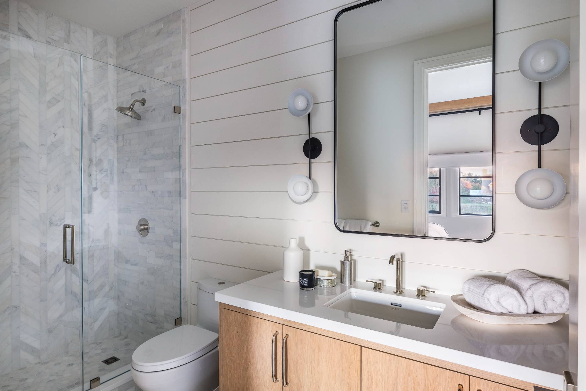 Undisclosed Address Sagaponack, NY 11962 - Photo 23 of 40 a bathroom with a granite countertop sink a toilet and shower