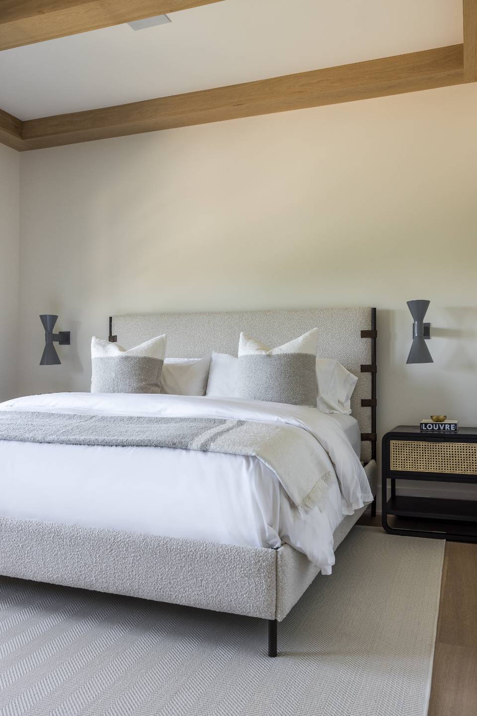 Undisclosed Address Sagaponack, NY 11962 - Photo 26 of 40 a spacious bedroom with a bed and a lamp