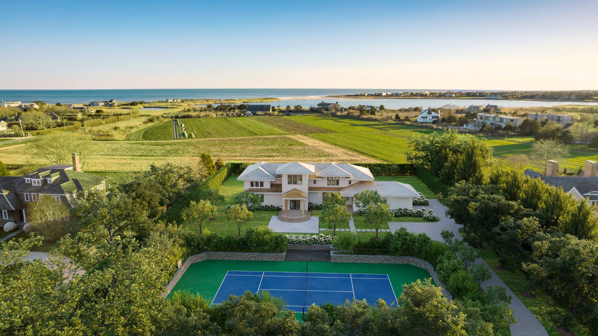 Undisclosed Address Sagaponack, NY 11962 - Photo 37 of 40 an aerial view of a house with a garden and lake view