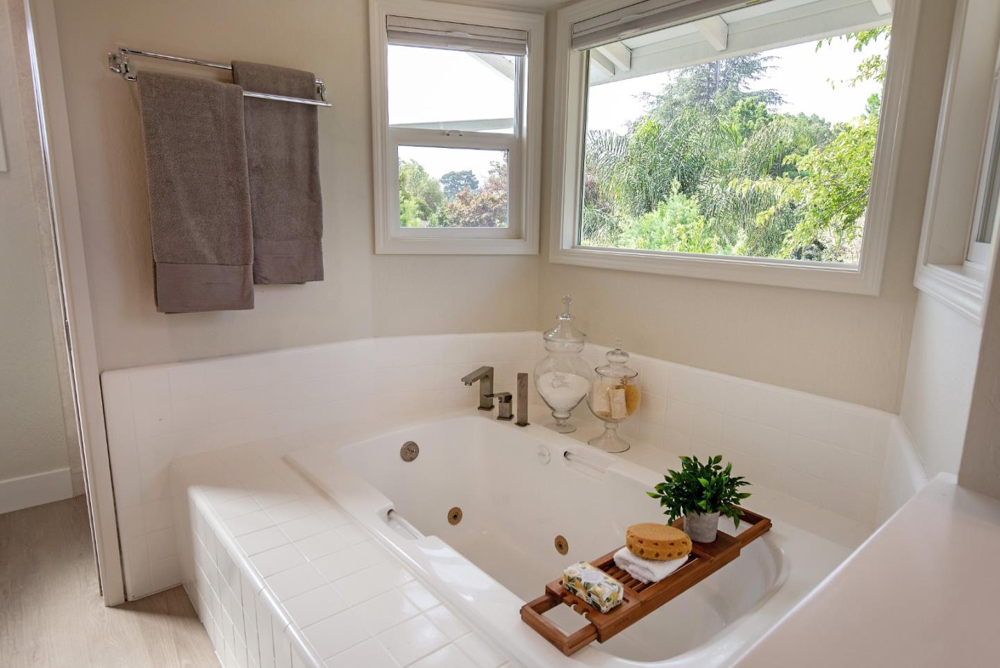 2487 Gunar Drive San Jose, CA 95124 - Photo 15 of 33 a bathroom with a tub a sink and a window