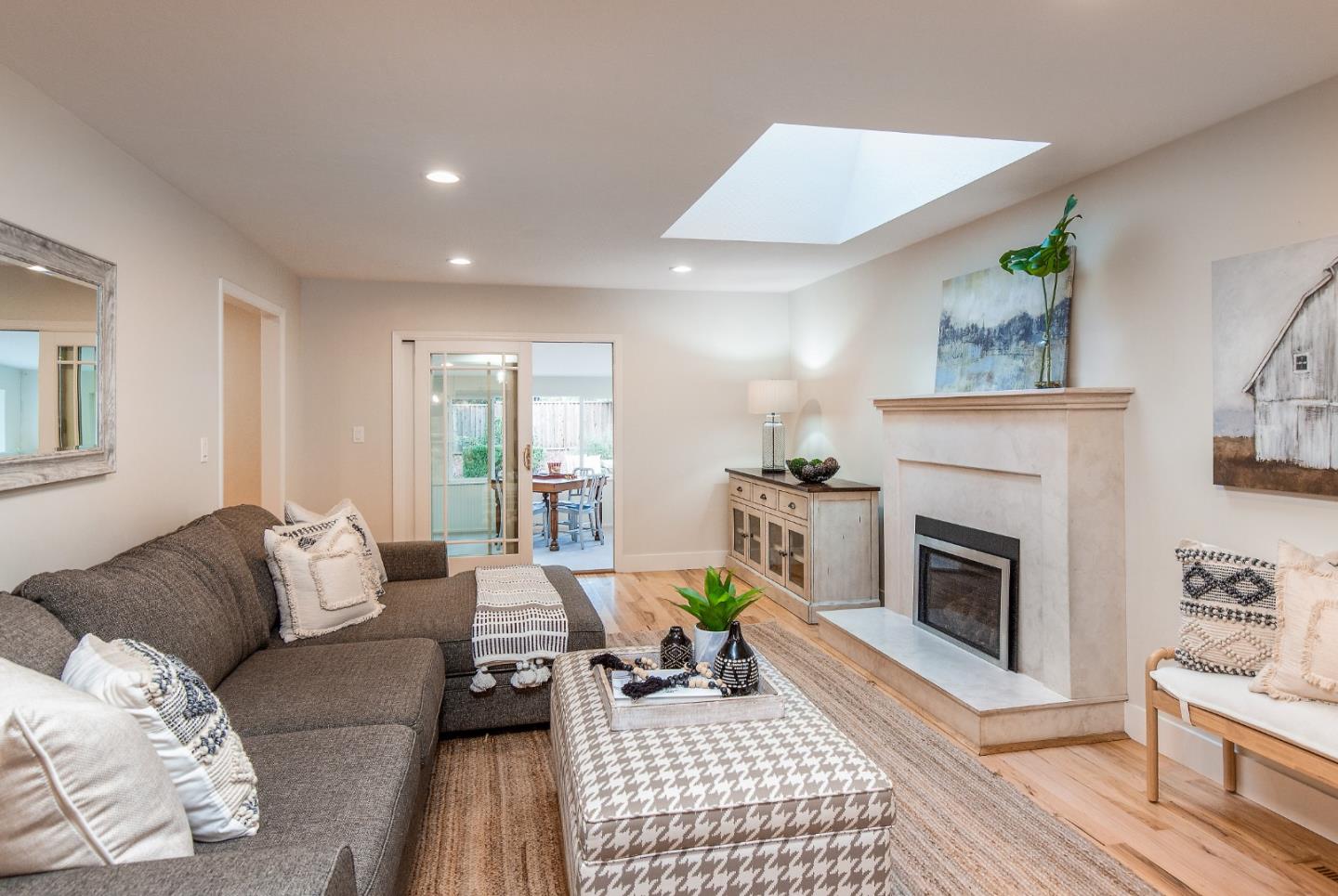 2487 Gunar Drive San Jose, CA 95124 - Photo 3 of 33 a living room with furniture and a fireplace
