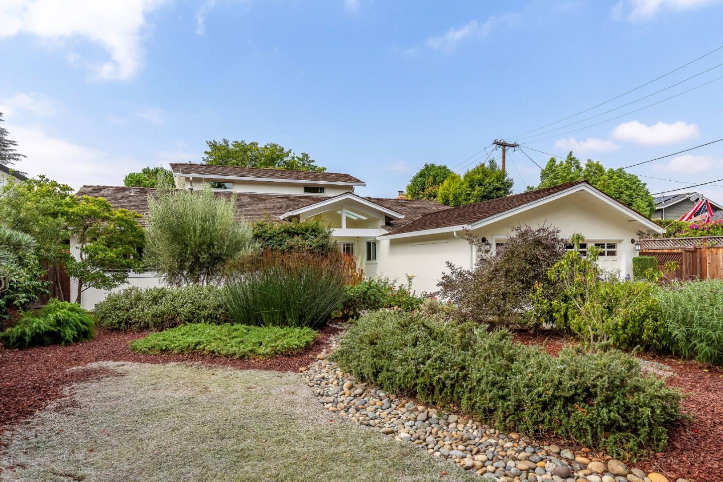 2487 Gunar Drive San Jose, CA 95124 - Photo 33 of 33 a view of a house with a yard and potted plants