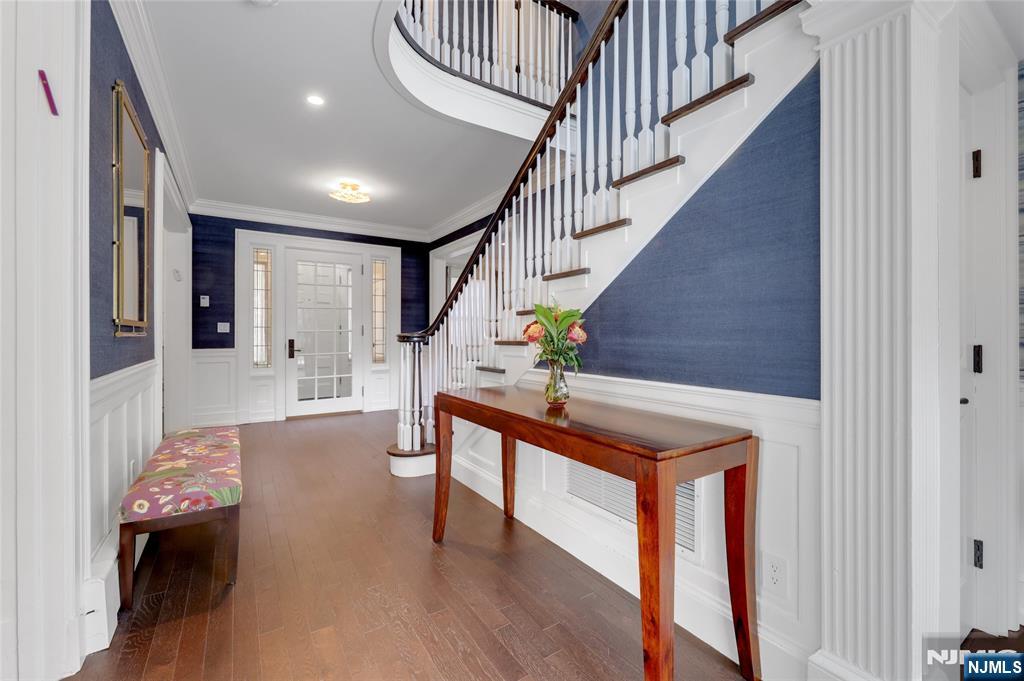 292 Maple Street Englewood, NJ 07631 - Photo 3 of 48 a room with furniture and wooden floor