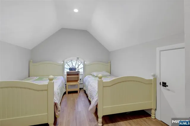 a view of a livingroom with furniture and wooden floor