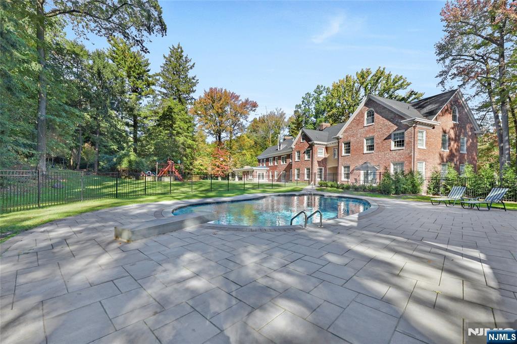 292 Maple Street Englewood, NJ 07631 - Photo 41 of 48 a view of house with outdoor space and lake view