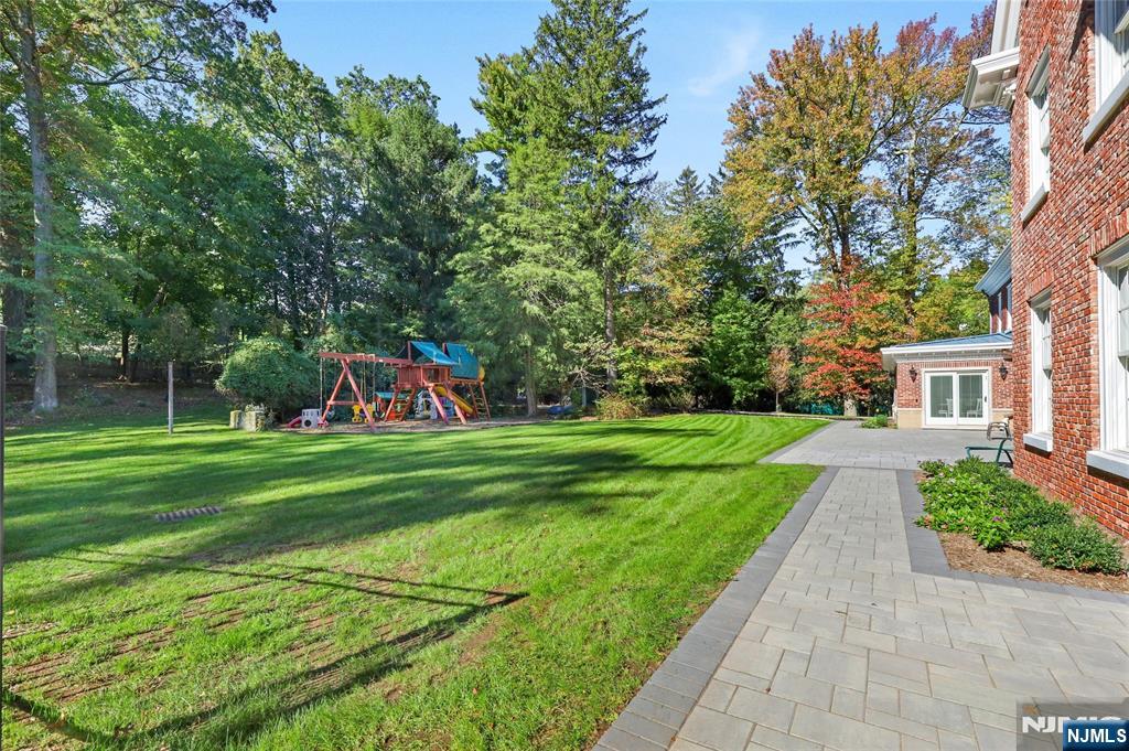 292 Maple Street Englewood, NJ 07631 - Photo 42 of 48 a view of a house with a yard