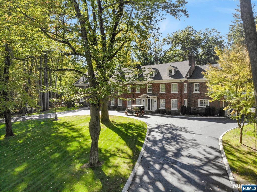 292 Maple Street Englewood, NJ 07631 - Photo 44 of 48 a view of a house with yard and sitting area