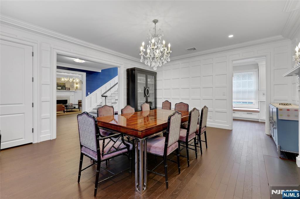292 Maple Street Englewood, NJ 07631 - Photo 7 of 48 a view of a dining room with furniture and wooden floor