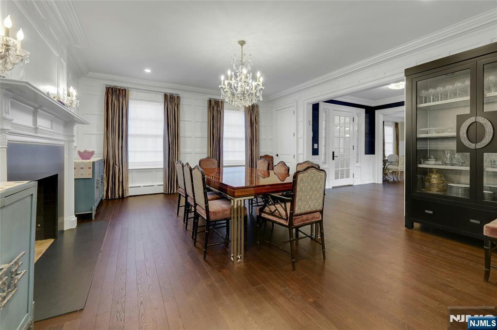 292 Maple Street Englewood, NJ 07631 - Photo 8 of 48 a view of a dining room with furniture and wooden floor
