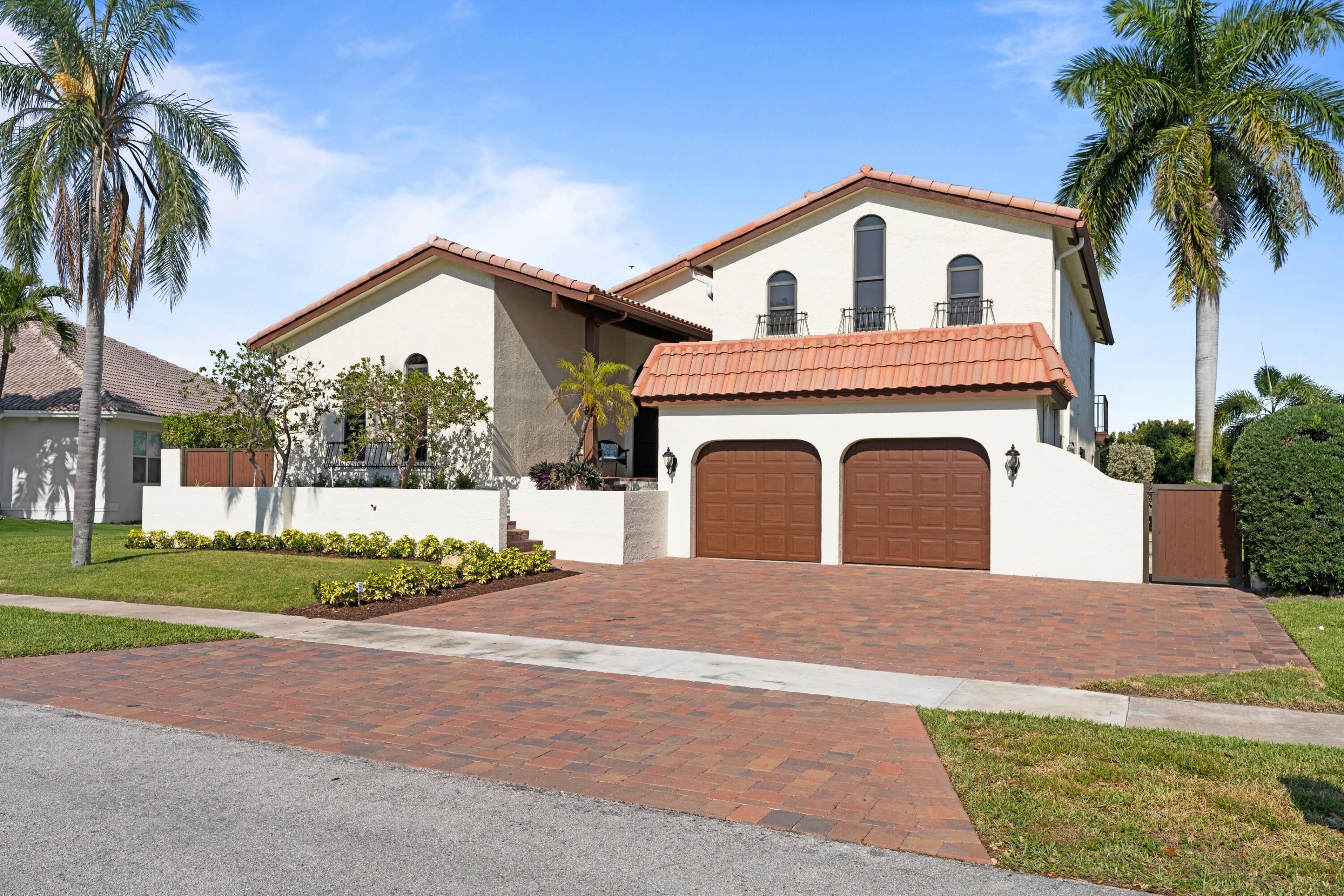 293 Northwest 64th Street Boca Raton, FL 33487 - Photo 27 of 39 Front Exterior