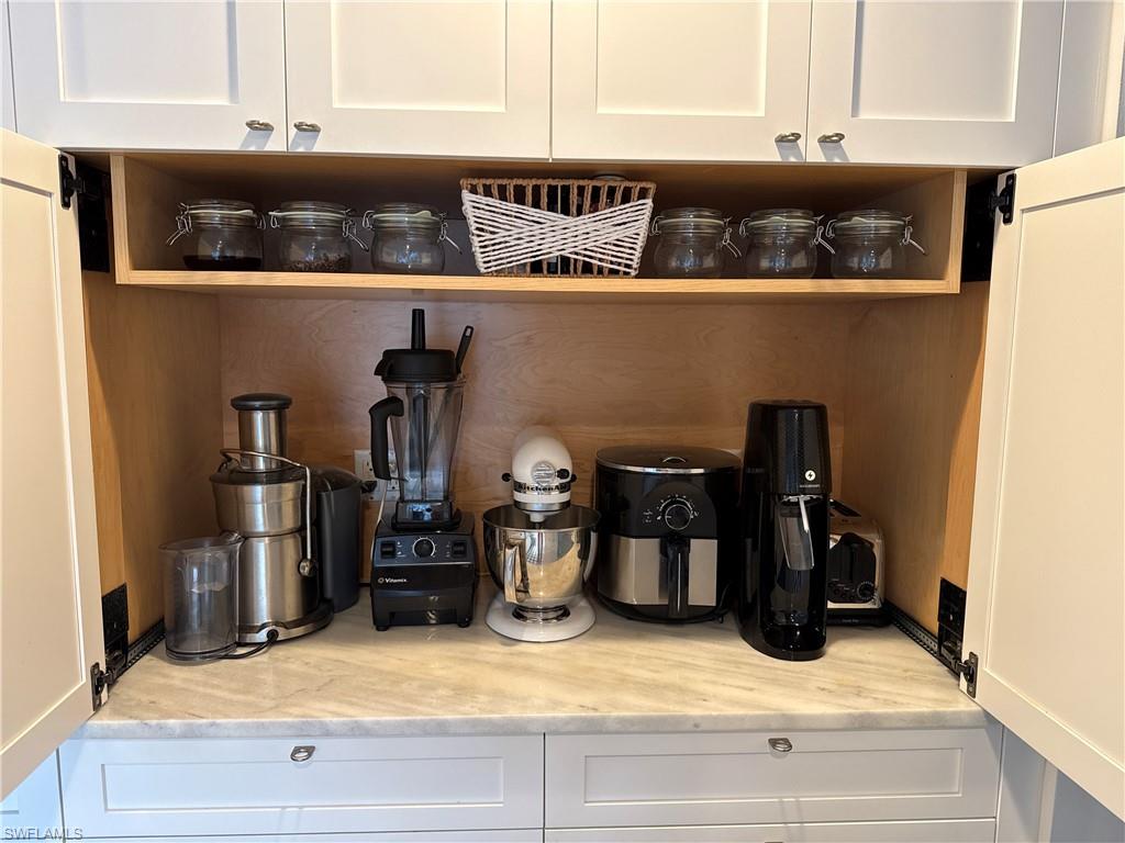 2120 Sandpiper Street Naples, FL 34102 - Photo 14 of 48 Baker’s niche and appliance hideaway.