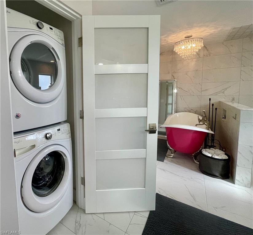 2120 Sandpiper Street Naples, FL 34102 - Photo 23 of 48 Vented full size stacked washer dryer
