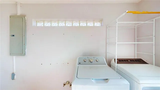 a utility room with dryer and washer