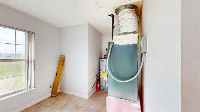 a view of a living room with furniture