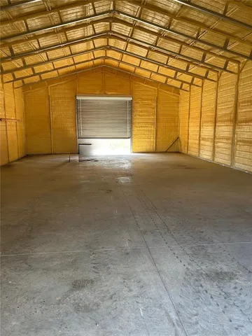 a view of empty room with windows