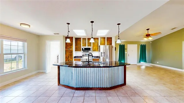 a view of a living room and entry way