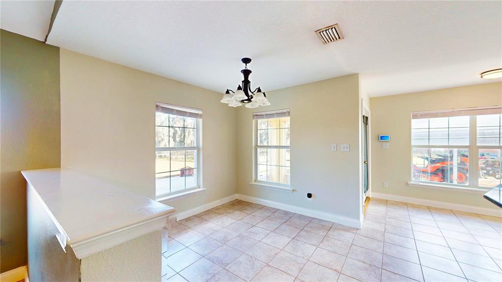1193 Sand Mountain Road Fort Meade, FL 33841 - Photo 10 of 33 a view of an empty room with a window
