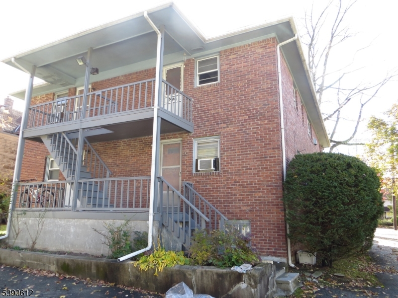 623 Bloomfield Avenue West Caldwell, NJ 07006 - Photo 9 of 13 a view of a house with a yard