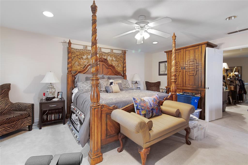 4988 Thunder Road Dallas, TX 75244 - Photo 19 of 31 a living room with furniture a chandelier and a window