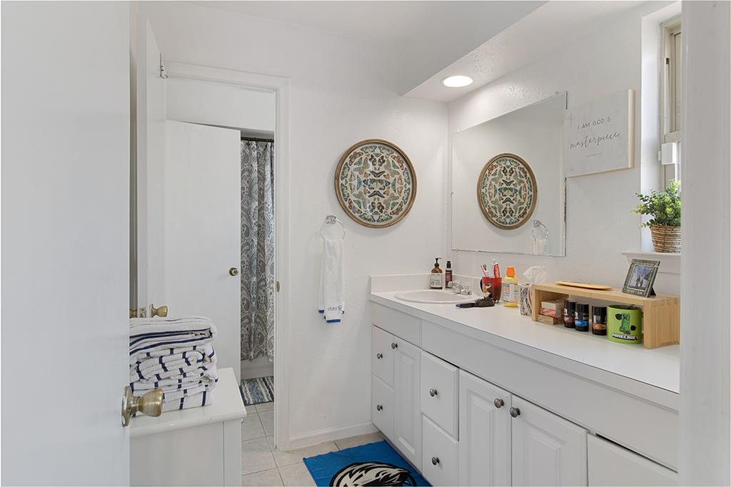 4988 Thunder Road Dallas, TX 75244 - Photo 25 of 31 a view of storage and shower