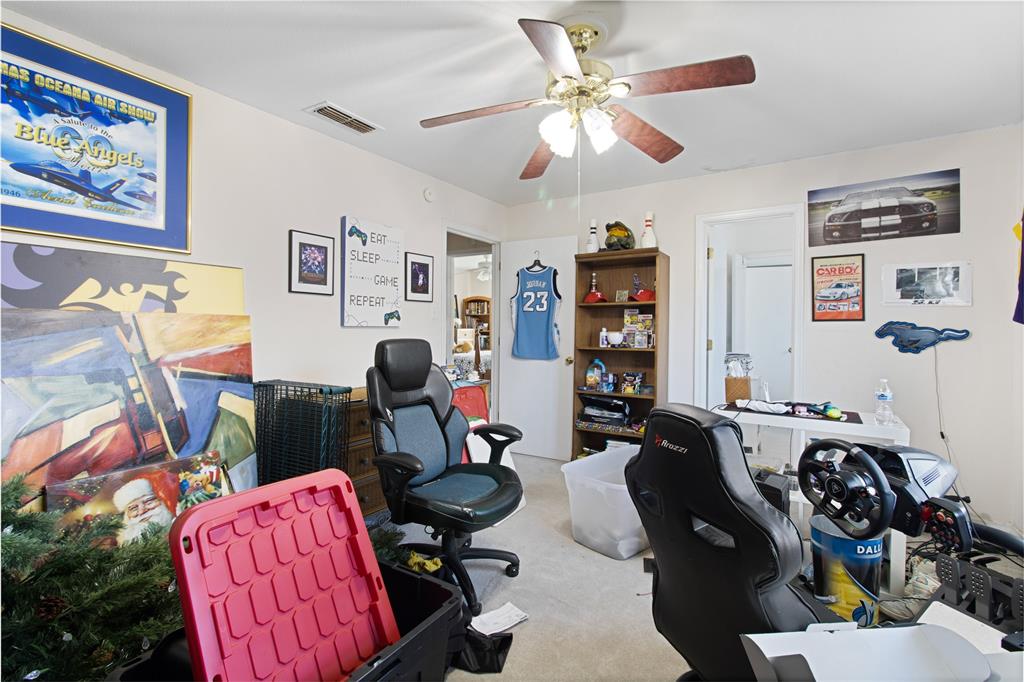 4988 Thunder Road Dallas, TX 75244 - Photo 26 of 31 a view of a workspace with furniture and toys