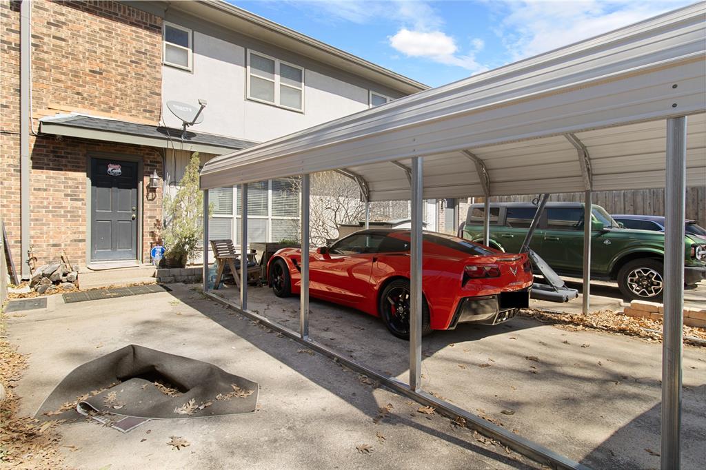 4988 Thunder Road Dallas, TX 75244 - Photo 30 of 31 a view of a cars park in front of house