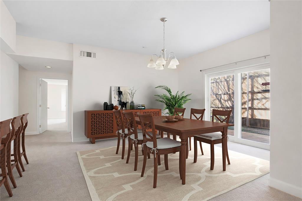 4988 Thunder Road Dallas, TX 75244 - Photo 9 of 31 a view of a dining room with furniture
