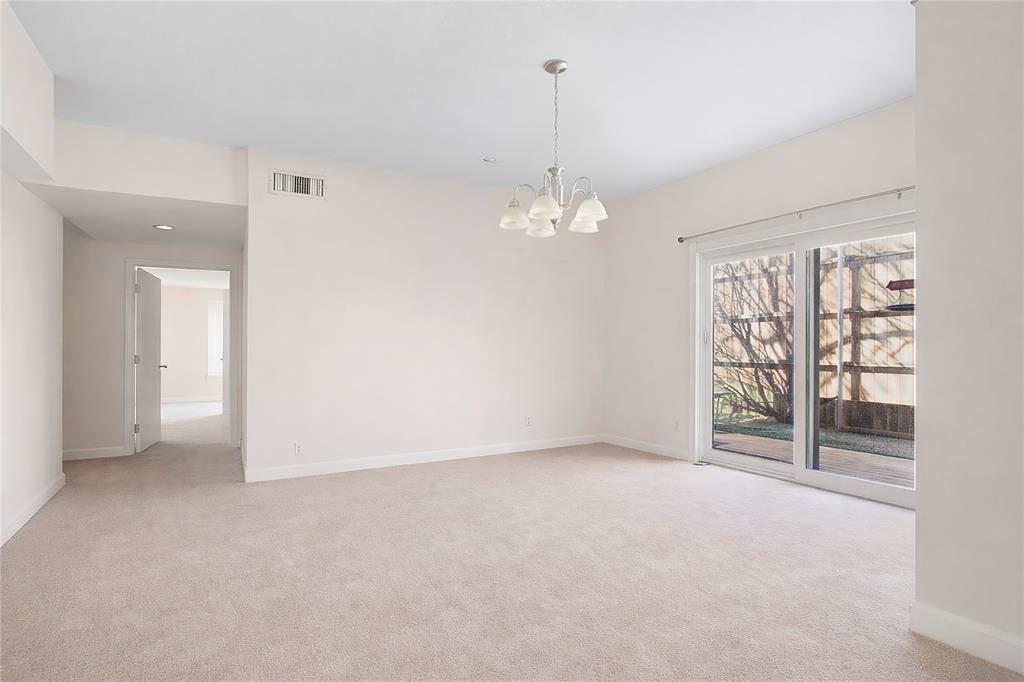 4988 Thunder Road Dallas, TX 75244 - Photo 10 of 31 a view of an empty room with a window